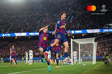 Pedri and a Barcelona teammate celebrating a goal at Spotify Camp Nou during a UEFA Champions League match. Mastercard and UEFA Champions League logos at the top right corner.