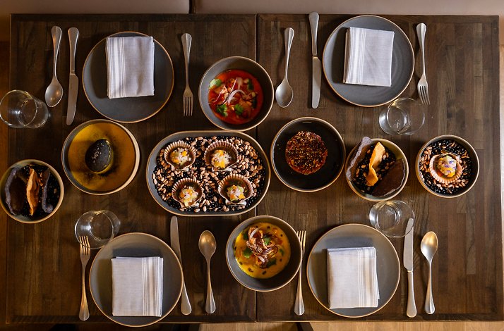 A plethora of Mexican-Peruvian cuisine dishes served on the table.