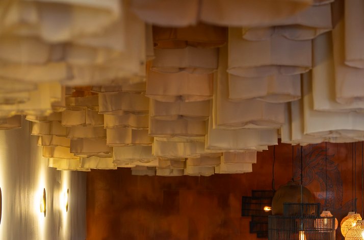 Elegant ornaments hanging from the roof at Kayao Chicago.