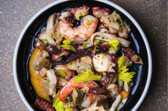 Fresh seafood salad with octopus and shrimp from Bar Bucce in Miami, Florida.
