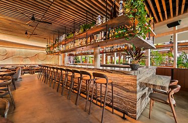 MILA rooftop bar private dining experience with reserved seating.