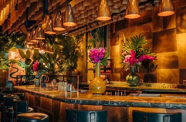 The interior of Crying Tiger, featuring its luxurious drink bar.