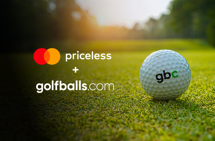 A golf ball with the gbc logo and Mastercard golfballs.com logos.