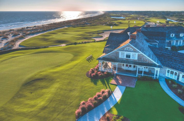This image shows the Kiawah Island Golf Resort clubhouse situated alongside the oceanfront course.