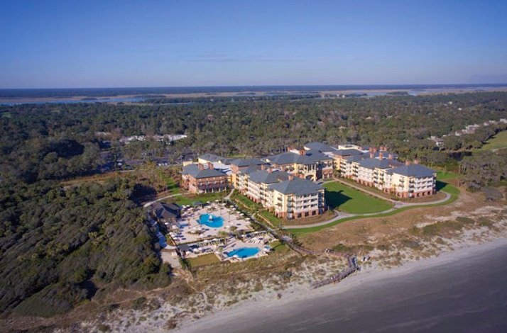 The aerial view of The Sanctuary at Kiawah Island Golf Resort, featuring prominent oceanfront pools.