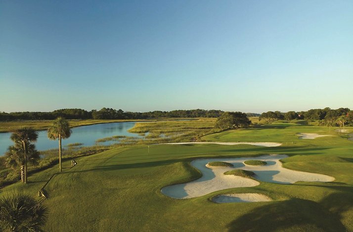 This image features a scenic fairway and bunker layout on the Oak Point golf course at the Kiawah Island Golf Resort.