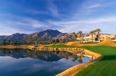 A view of the PGA West Nicklaus Tournament Course in La Quinta, California, featuring its signature water hazards and desert mountain backdrop.