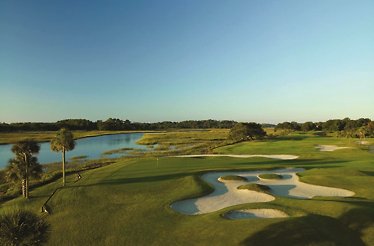 This image features a scenic fairway and bunker layout on the Oak Point golf course at the Kiawah Island Golf Resort.