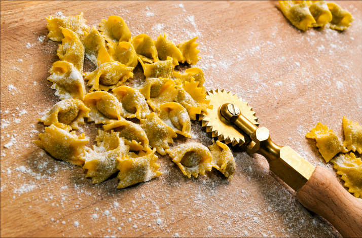 Handmade floured agnolotti with cutter