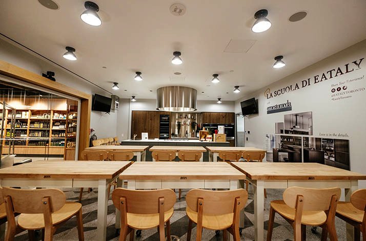 Workshop area with multiple tables set up for the del plin workshop at Eataly Toronto restaurant.