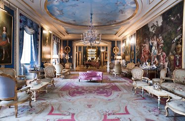 Elegant Liria palace interior with ornate furniture, chandeliers, frescoed ceiling, and detailed artwork