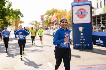 Runner nearing the finish line at the Staten Island Half Marathon.