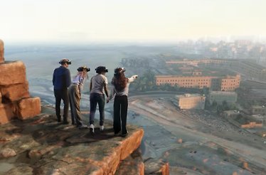 Four people in VR headsets standing on a cliffside, experiencing the Horizon of Khufu virtual reality tour of Egypt.