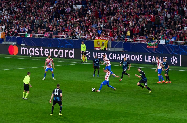 A match scene of Atletico Madrid versus Club Brugge KV during UEFA Champions league knockout play-off second leg.