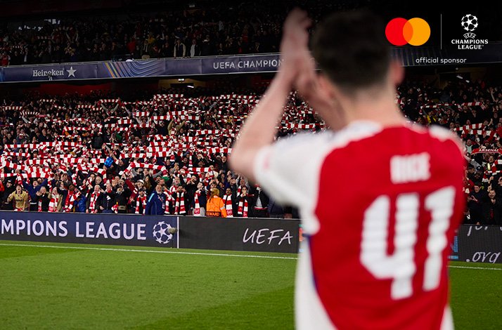 Football players photographed during UEFA Champions League match.