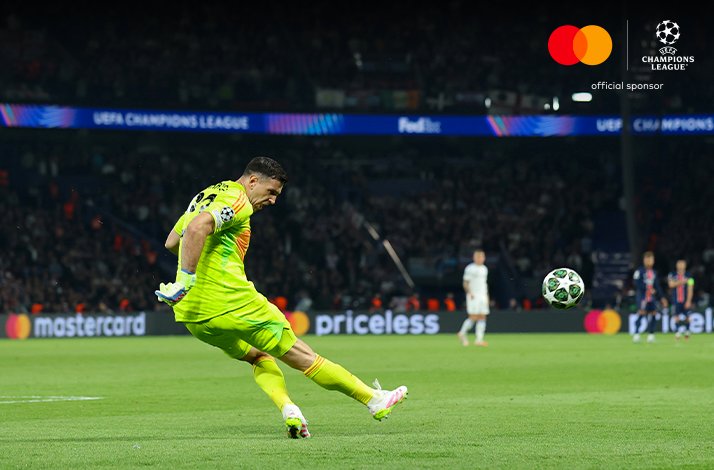 Football players photographed during UEFA Champions League match.