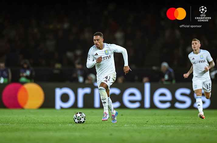 Football players photographed during UEFA Champions League match.