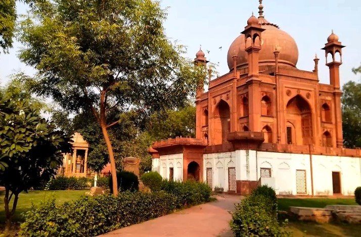 View at the Red Taj surrounded by trees.