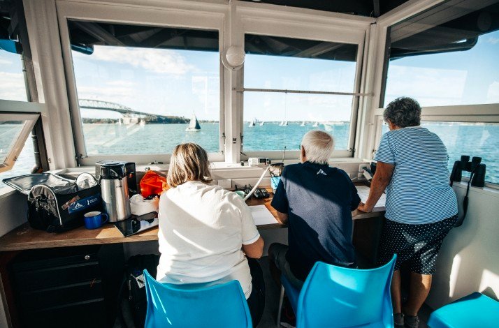Participants looking at a marina from the commodore's perch
