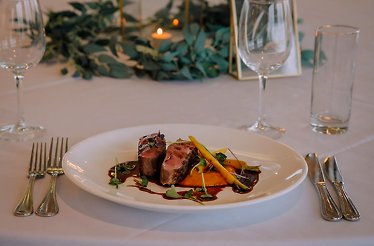 Plate of special dish with cutlery  from five-course menu at  Park Hyatt Auckland.