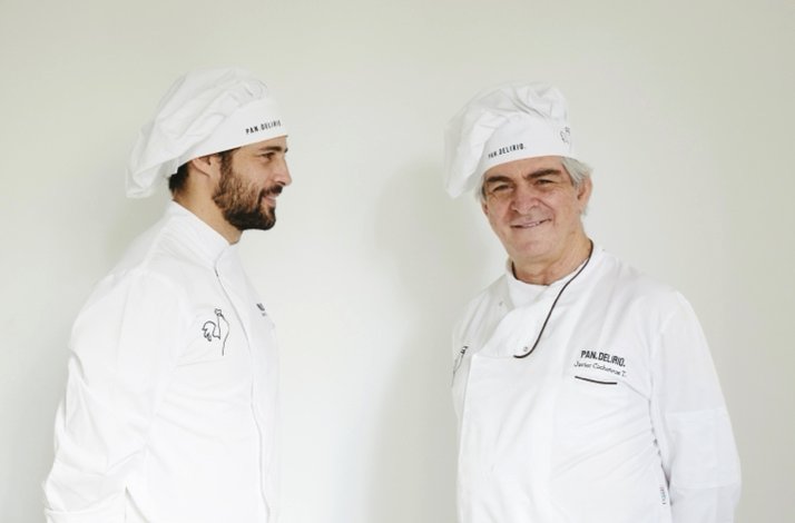 Javier Cocheteaux and his father pose in chef uniforms.