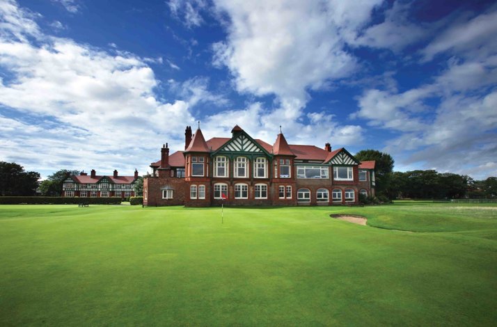 Royal Birkdale Golf Club, main clubhouse with a flag on the course.