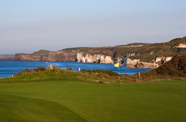 View at the cliffed coastline of Royal Portrush Golf Club.