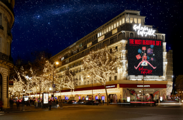 A view of the building Galeries Lafayette decorated for Christmas.