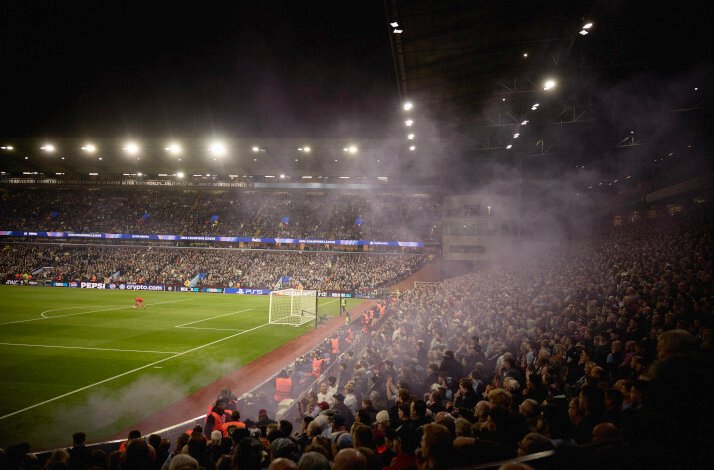 View of the stadium from a crowded stand.