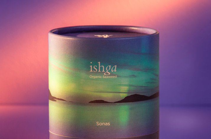 ishga fragrance candle in a package illustrated with sunset over the sea