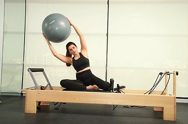 The celebrated fitness expert Yasmin Karachiwala showing exercises during workout session.