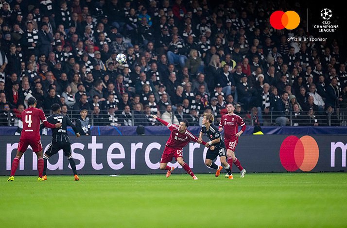 Players of Eintracht Frankfurt and Liverpool FC photographed during an UEFA Champions League match.