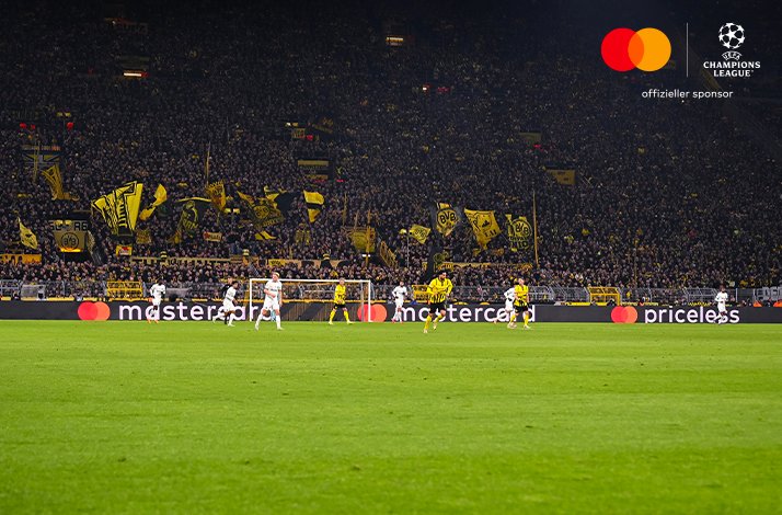 Football players photographed during UEFA Champions League match.