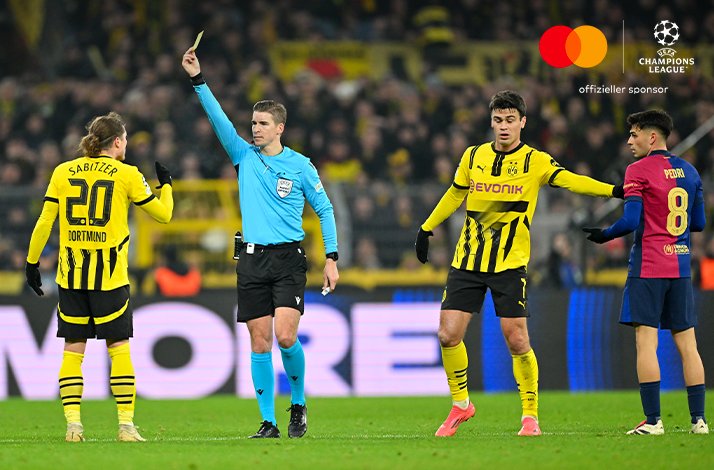 Players of Borussia Dortmund and FC Barcelona photographed during an UEFA Champions League match
