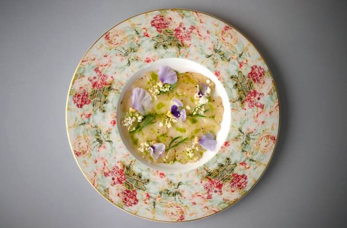 Fish carpaccio on a floral plate from Restaurant Badi.