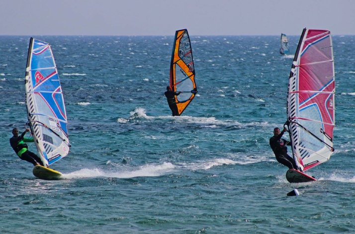 3 people windsurfing at Medulin, Croatia