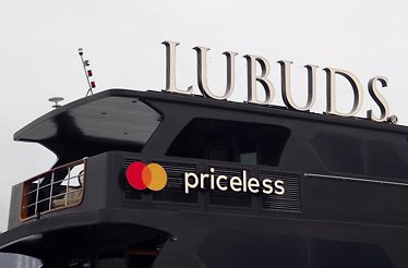 LUBUDS' newly renovated yacht and Priceless logo on it.