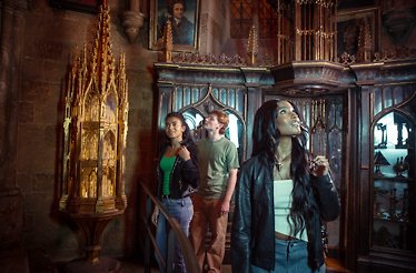 Visitors looking at the set of a Dumbledore's office during Warner Bros. Studio Tour in London