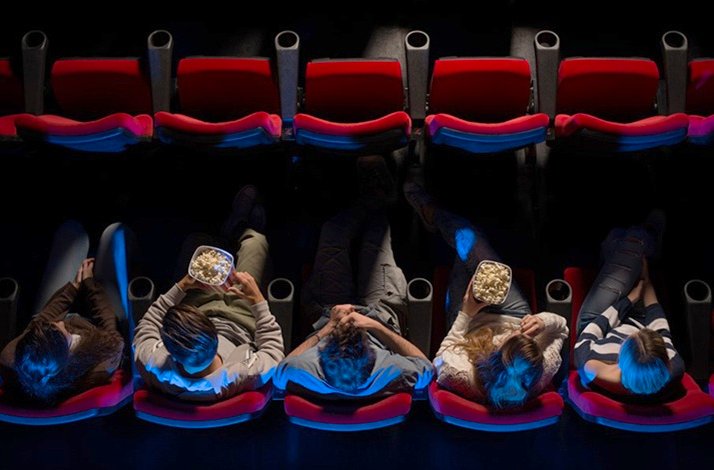 People watching a movie in a cinema, photographed from above