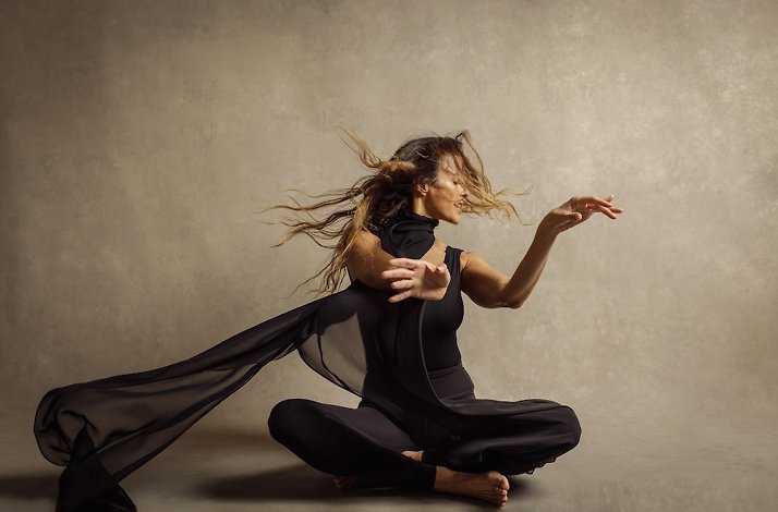 A woman in black clothes moved during the transformative session of The Class designed to foster self-expression​