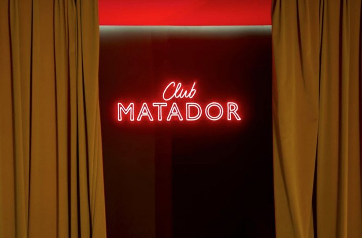 Neon sign reading 'Club Matador'