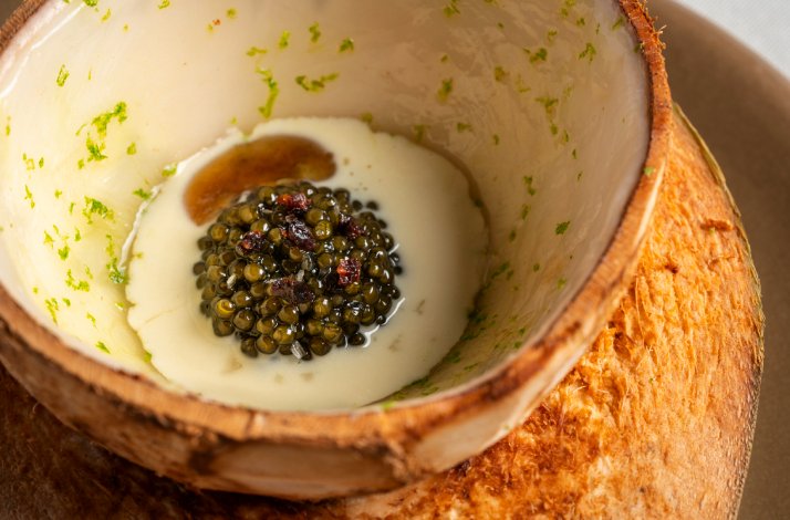 Coconut & smoked caviar inside the coconut shell