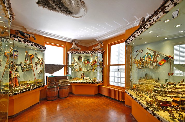Large display cases with a wide variety of toys at Istanbul Toy Museum.