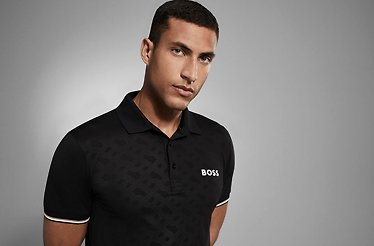 A model of BOSS wearing black t-shirt with white lines