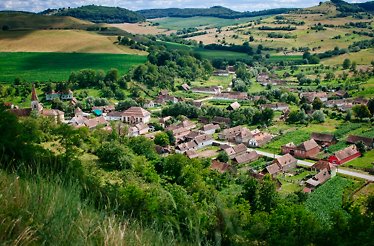 Bird view on a traditional romanian village among the hills