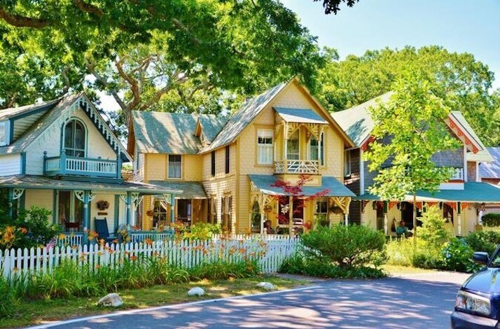 A two floor wooden house view in a historical village in Martha's Vineyard.