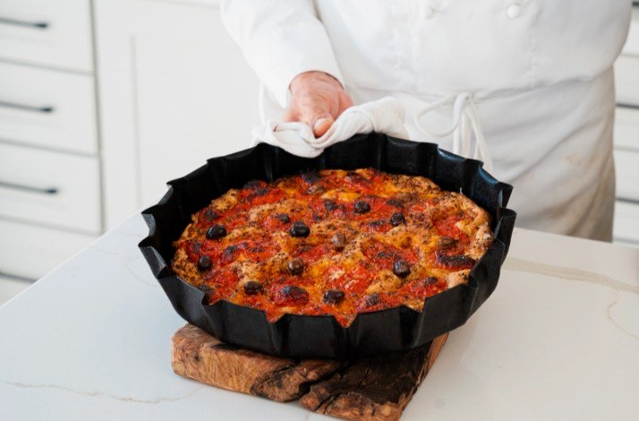 Italian pizza just taken out of the oven cooked by Chef Pasquale Martinelli.