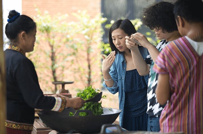 A couple participating in a tea experience at Araksa Tea Garden