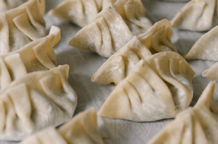 Wrapped Chinese dumplings made during the culinary workshop.