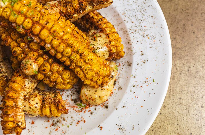 Freshly prepared dish with corn served at Dubai's most renowned restaurants
